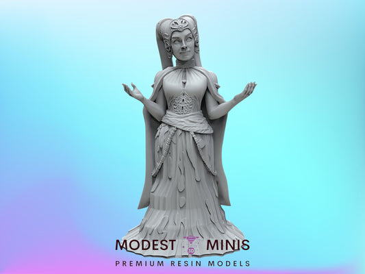 A statue of a woman with outstretched arms, wearing a long dress, against a blue background.