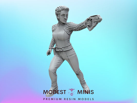 A statue of a woman in a futuristic outfit, holding a weapon, against a blue background.