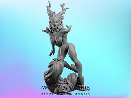 A statue of a woman with a flowing, ethereal hair design against a blue background.