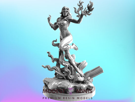A statue of a woman with a flowing, ethereal figure in her hands, set against a blue background.