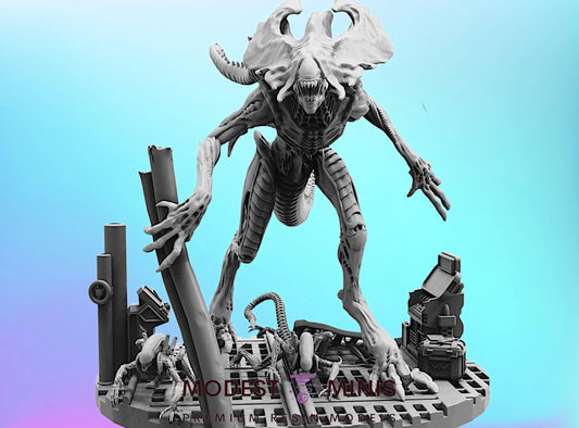 A 3D model of a large, menacing alien creature with sharp teeth and claws, standing on a platform surrounded by various mechanical and technological elements.